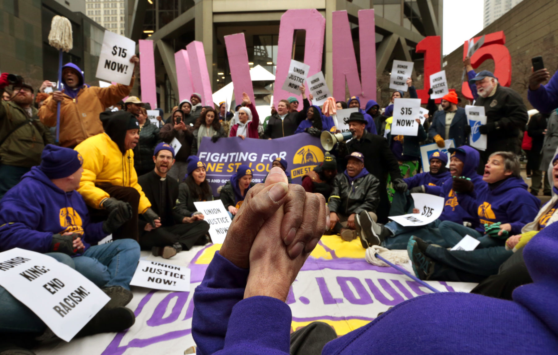Arrests made as protesters call for pay raise for local janitors